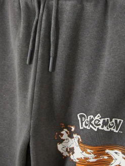 Calças Treino Pokémon Pikachu/Charizard